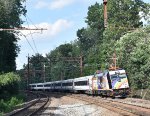 NJT Train # 6658 with ALP-46 # 4609 in the Pride Wrap 